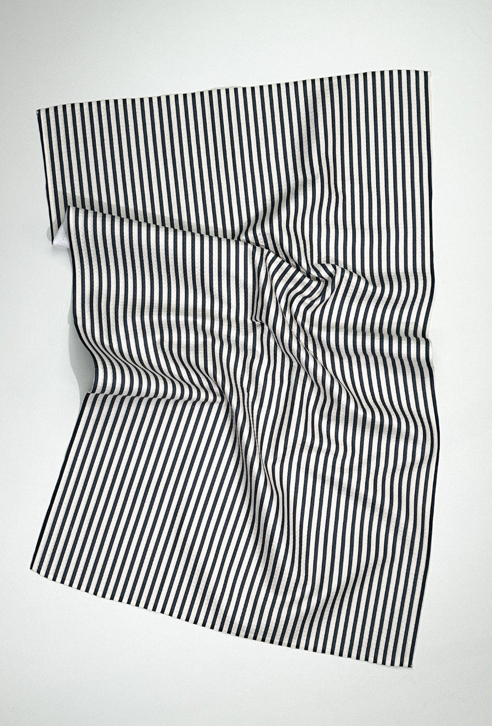 The Seersucker Dish Towel in Navy – the best eco-friendly kitchen tea towel made from recycled plastic in blue and white