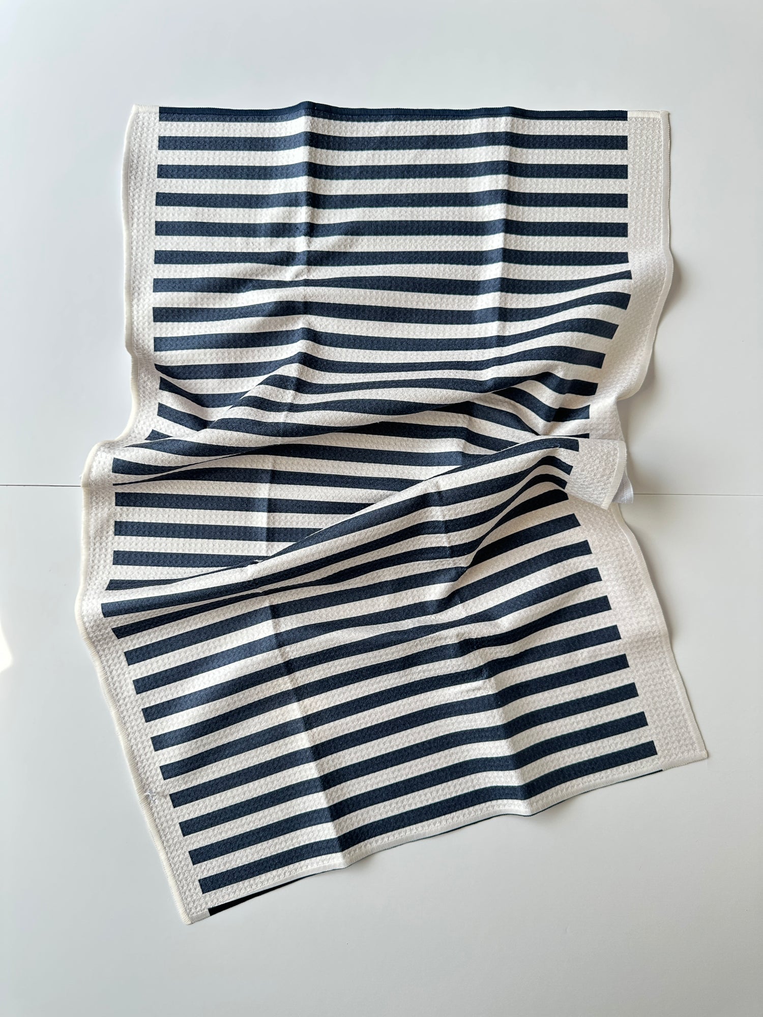 Eco-friendly dish towel made from recycled plastic bottles, coming soon from Disch.